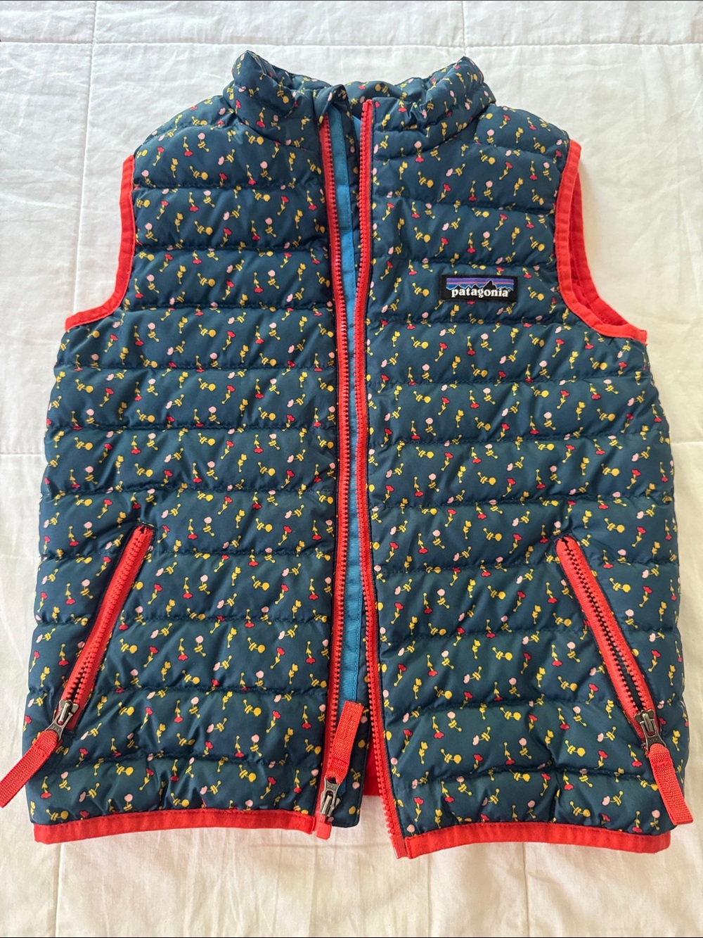 Patagonia Navy Quilted Vest with Red Trim and Multicolor Floral
